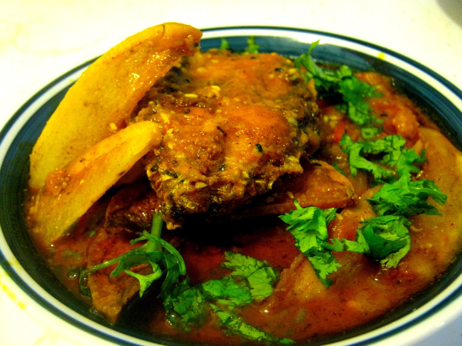 Rui Maacher jhol (rohu fish curry with potato)